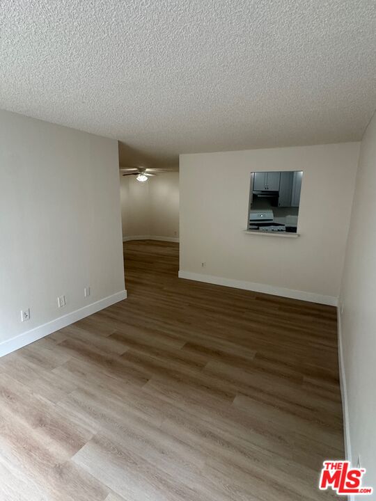 428 South Grand View Street Los Angeles, CA 90057 - Photo 10 of 29 a view of a livingroom and an empty space