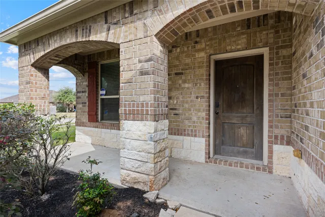 a front view of a house with a garage