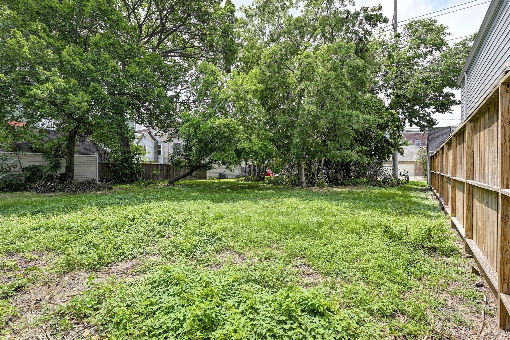 0 Ruthven Street Houston, TX 77019 - Photo 5 of 8 a view of a backyard with a garden
