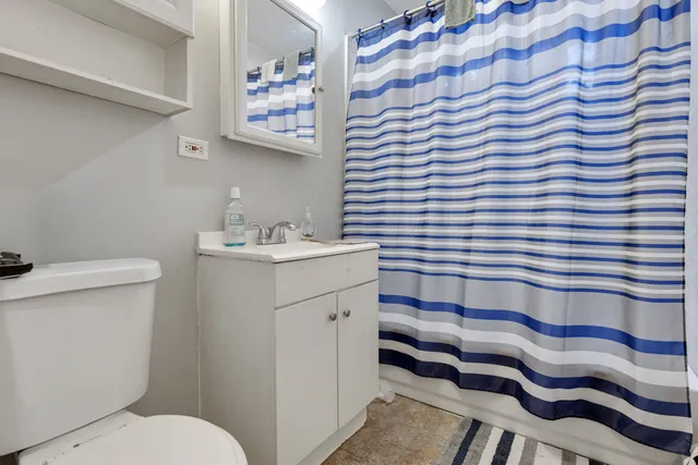a bathroom with a sink and a toilet