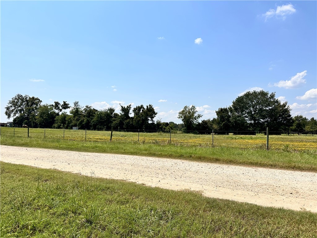 Tbd Tbd Williams Lane Bryan, TX 77808 - Photo 11 of 18 a view of a golf course with a lake