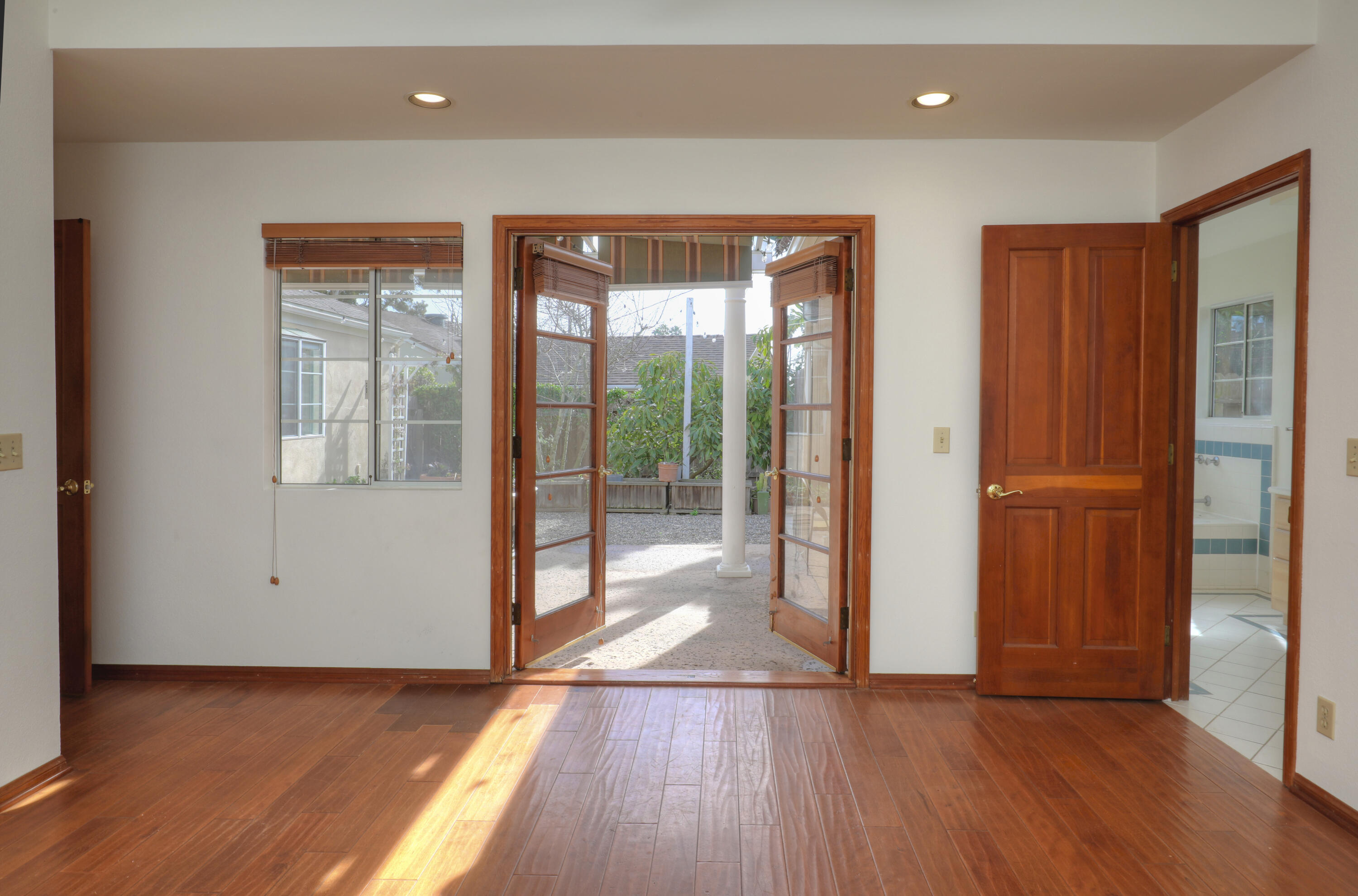 129 San Clemente Santa Barbara, CA 93109 - Photo 12 of 23 wooden floor in an empty room with a window