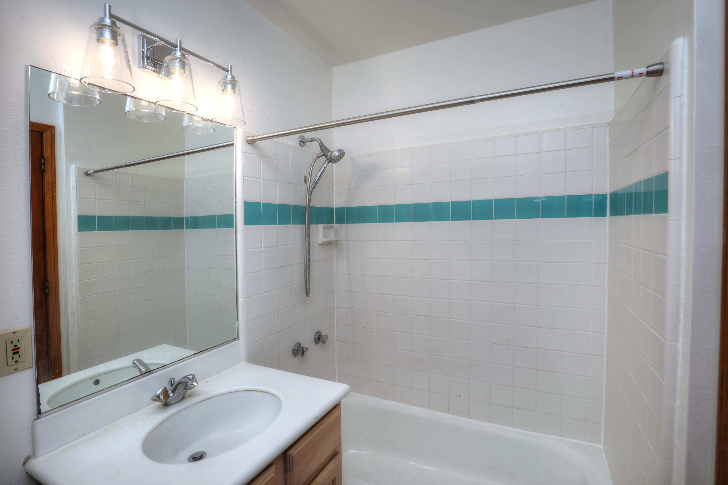 129 San Clemente Santa Barbara, CA 93109 - Photo 17 of 23 a bathroom with a sink and a shower