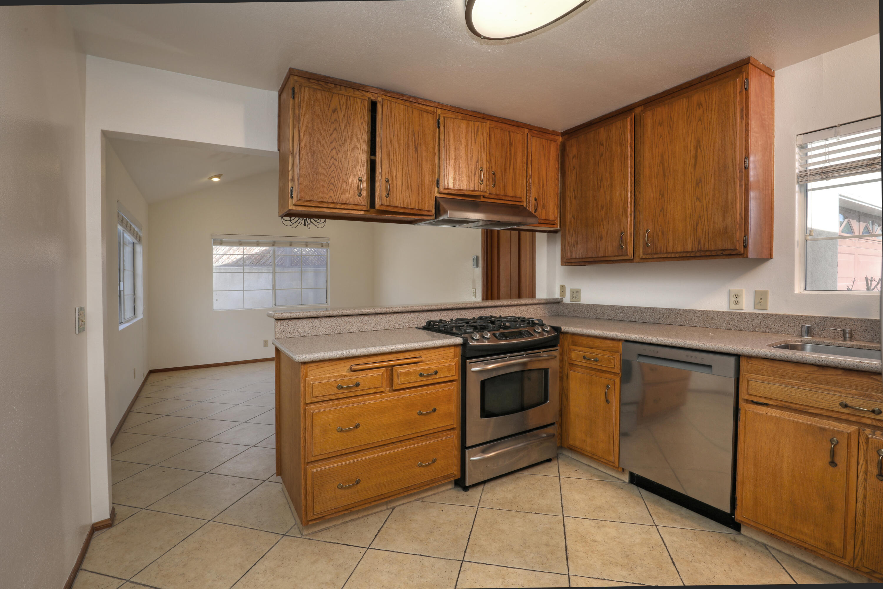 129 San Clemente Santa Barbara, CA 93109 - Photo 5 of 23 a kitchen with cabinets appliances and a window