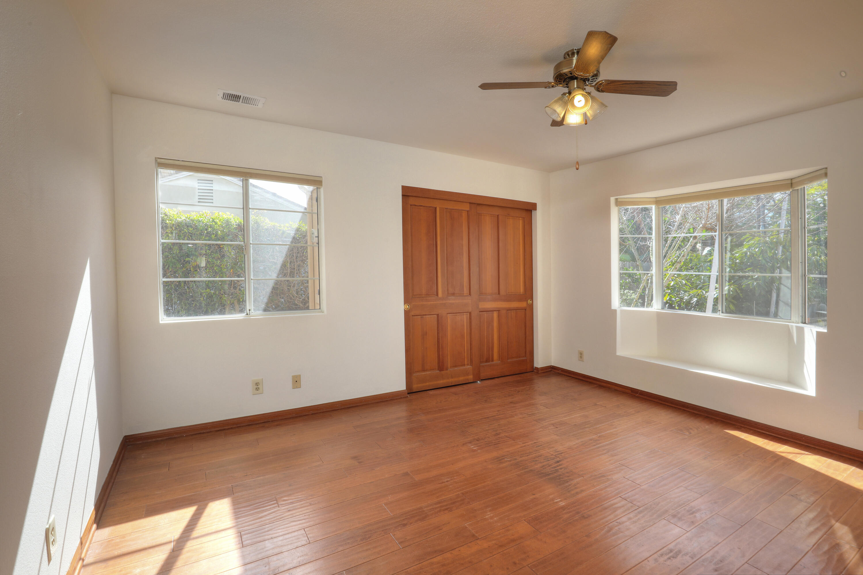 129 San Clemente Santa Barbara, CA 93109 - Photo 9 of 23 an empty room with windows and fan