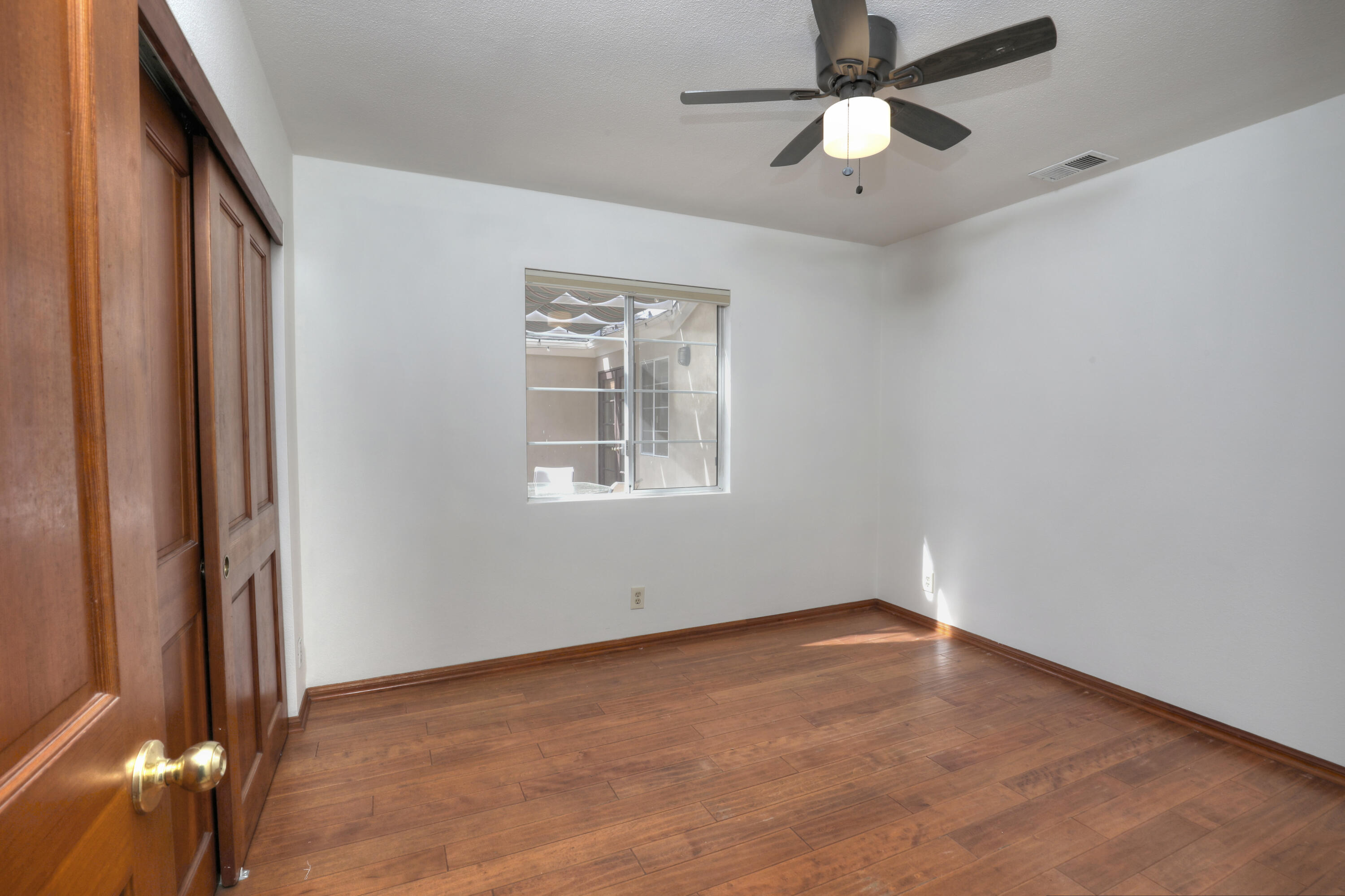 129 San Clemente Santa Barbara, CA 93109 - Photo 10 of 23 a view of an empty room with window and chandelier fan