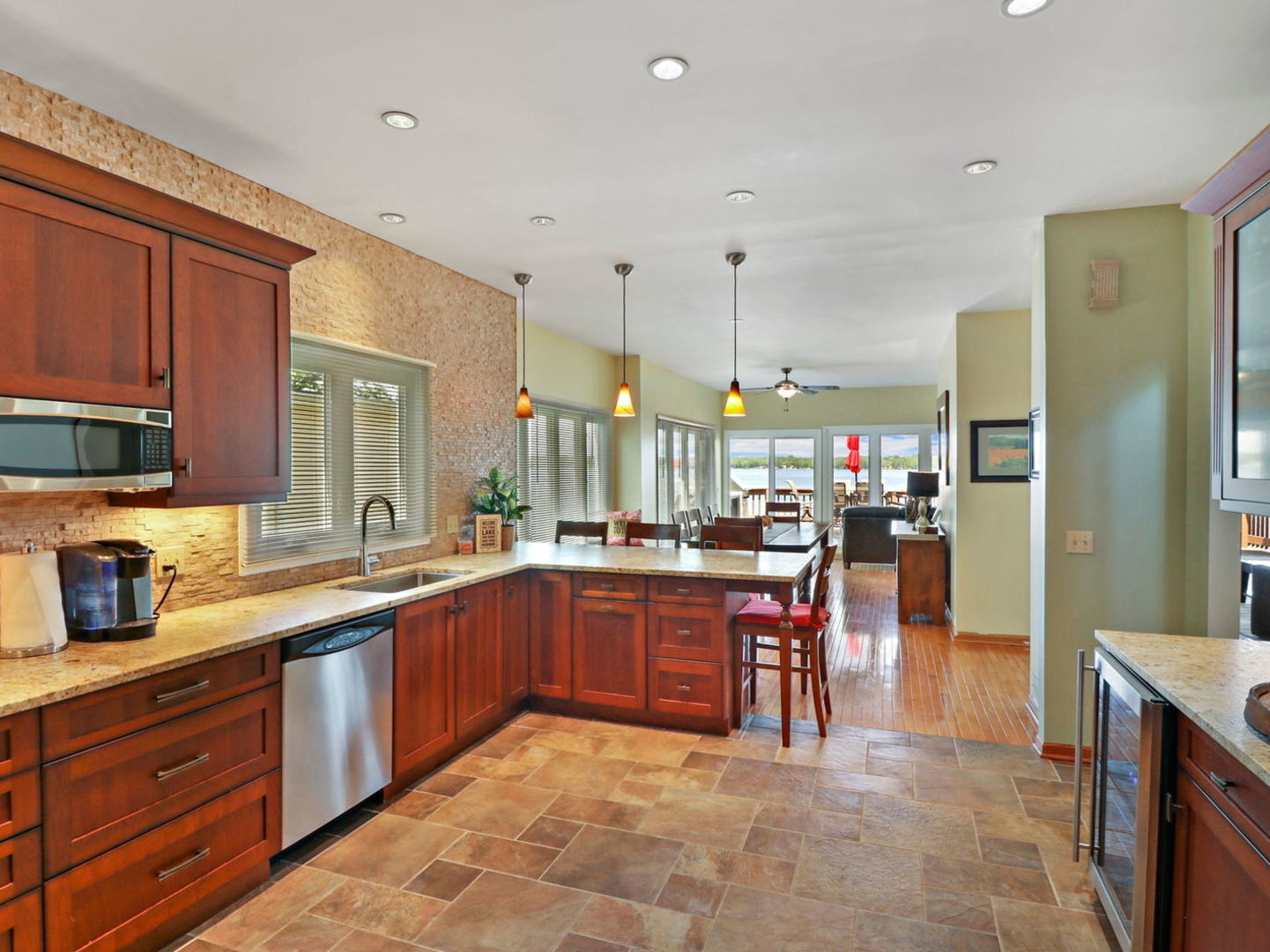 132 Eagle Point Road Fox Lake, IL 60020 - Photo 11 of 63 a large kitchen with lots of counter space and a sink