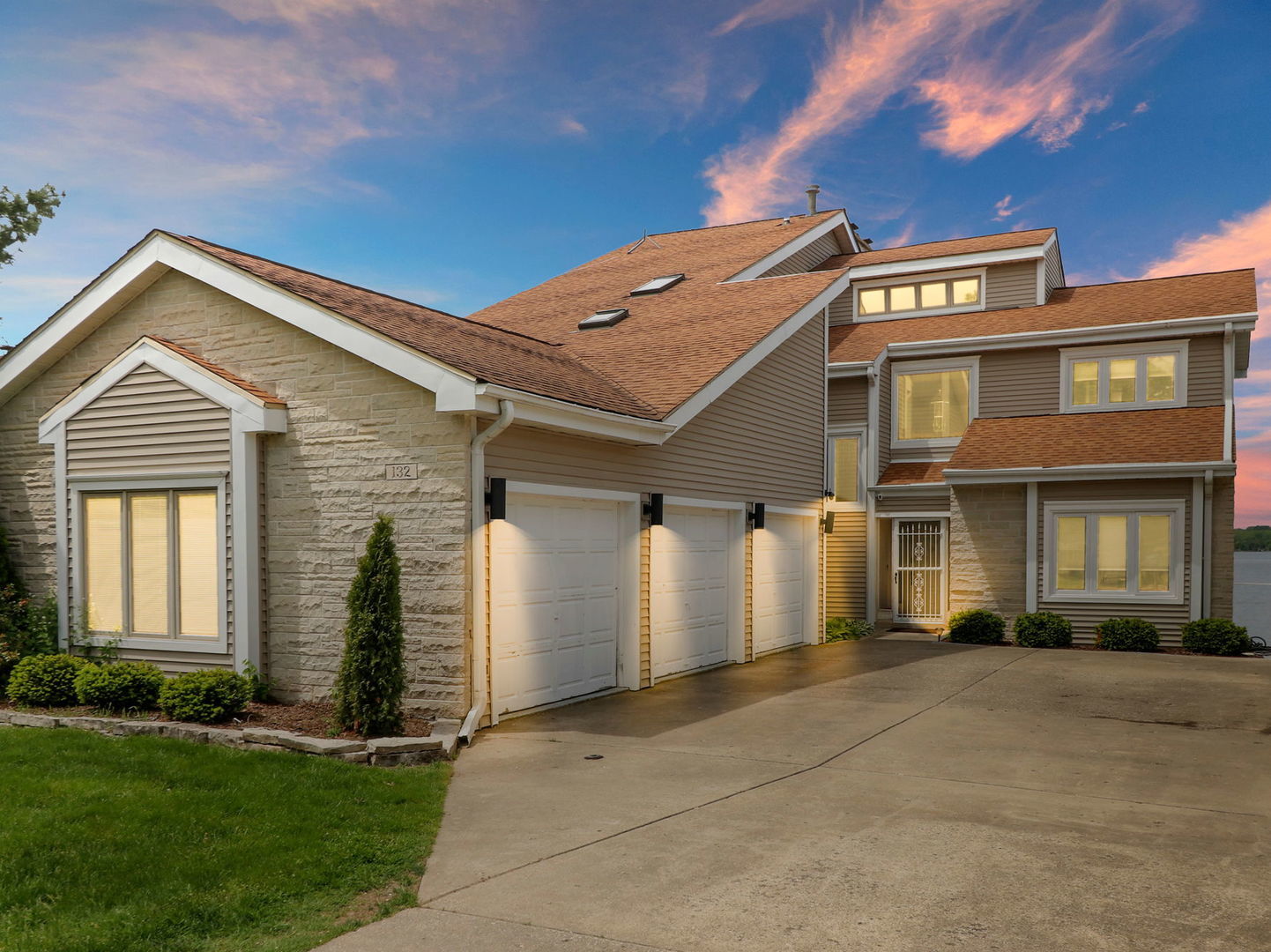 132 Eagle Point Road Fox Lake, IL 60020 - Photo 2 of 63 a front view of a house with a yard