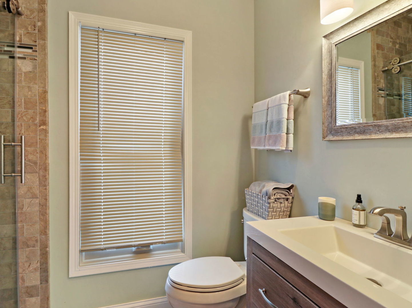 132 Eagle Point Road Fox Lake, IL 60020 - Photo 24 of 63 a bathroom with a sink a toilet and tub
