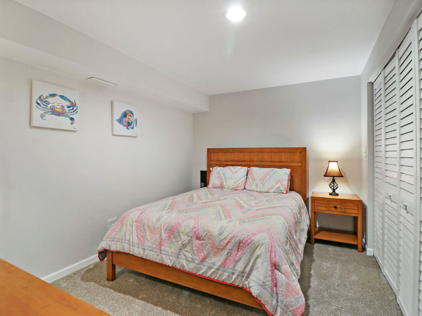 132 Eagle Point Road Fox Lake, IL 60020 - Photo 43 of 63 a bedroom with a bed and painting on the wall