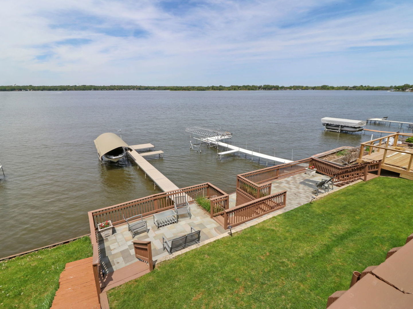 132 Eagle Point Road Fox Lake, IL 60020 - Photo 47 of 63 a view of a lake with a terrace