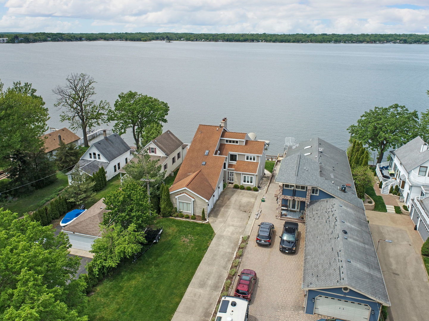 132 Eagle Point Road Fox Lake, IL 60020 - Photo 55 of 63 an aerial view of a house with a lake view