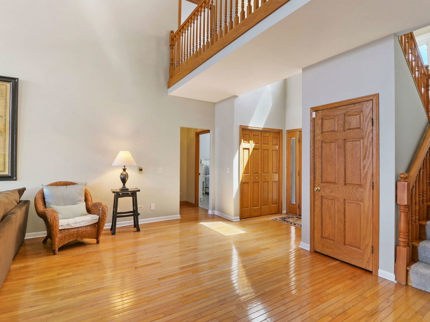 132 Eagle Point Road Fox Lake, IL 60020 - Photo 7 of 63 a view of a livingroom with wooden floor and furniture