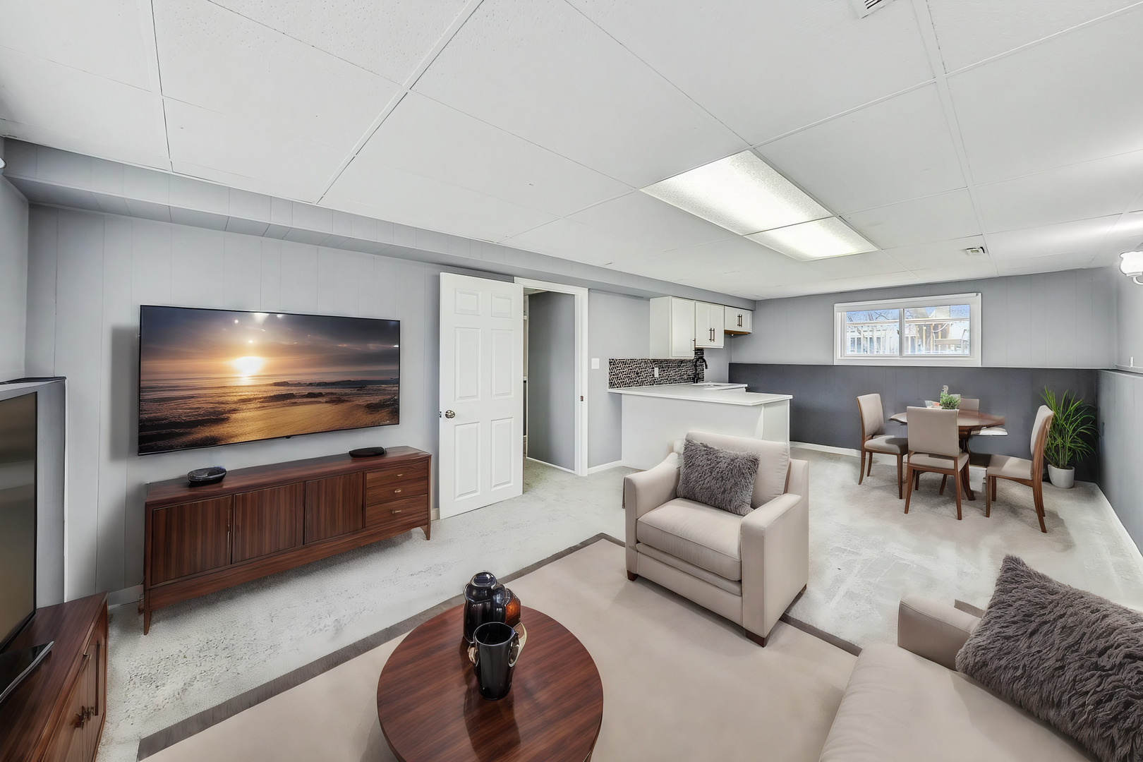 830 Russell Avenue Winthrop Harbor, IL 60096 - Photo 21 of 33 a living room with furniture and a flat screen tv