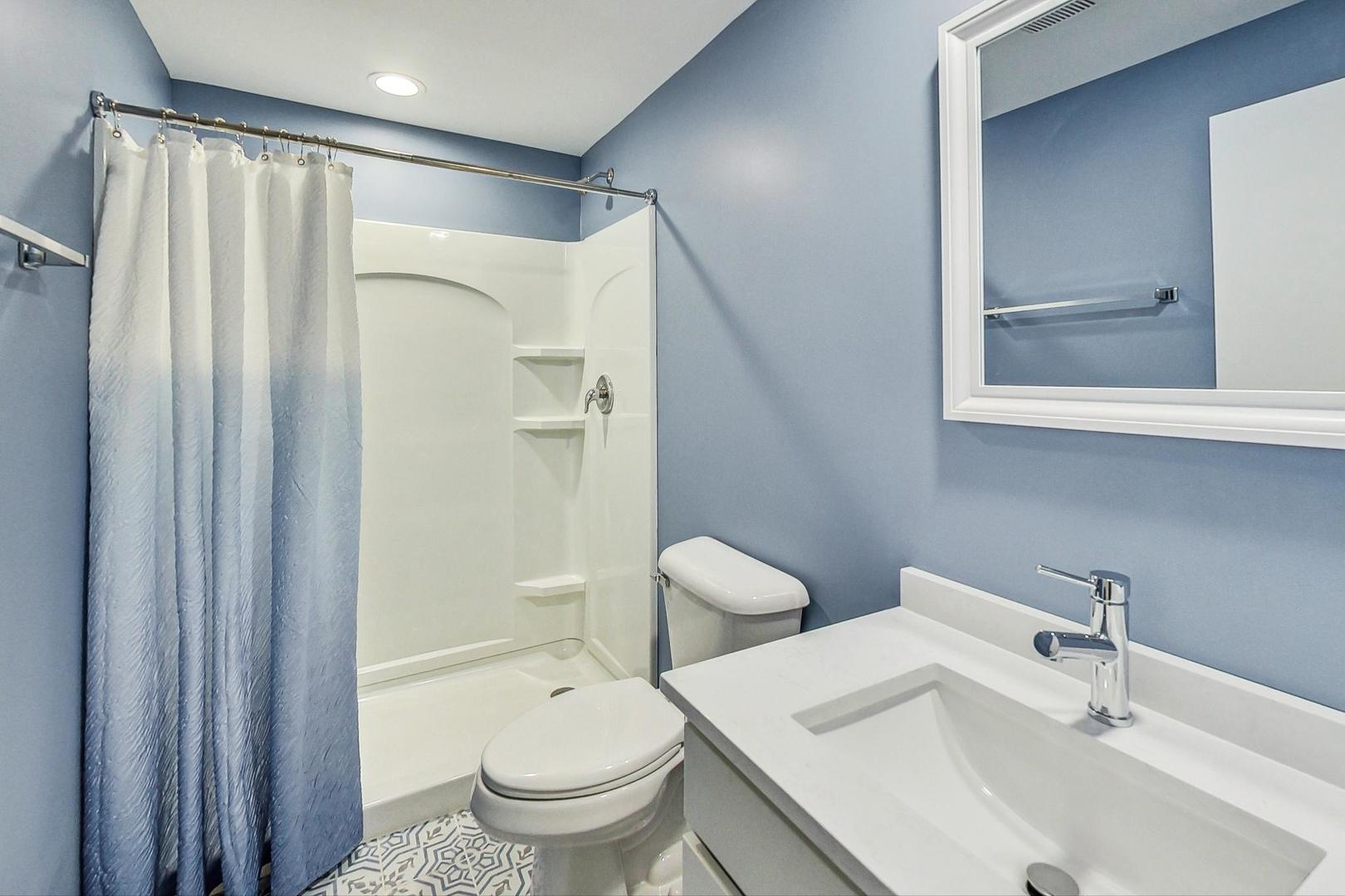 830 Russell Avenue Winthrop Harbor, IL 60096 - Photo 30 of 33 a bathroom with a sink toilet and shower