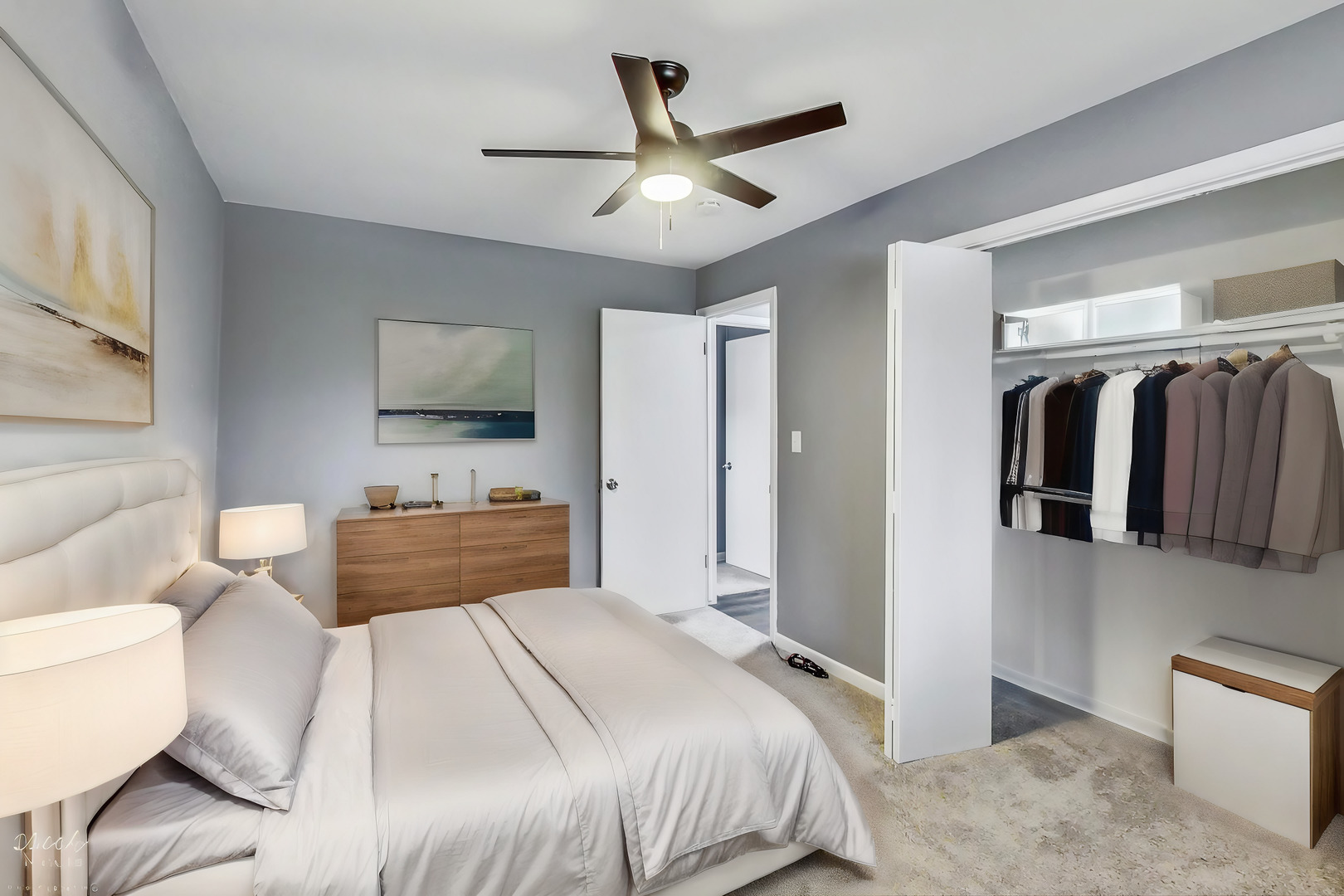 830 Russell Avenue Winthrop Harbor, IL 60096 - Photo 10 of 33 a bedroom with a large bed and a flat screen tv