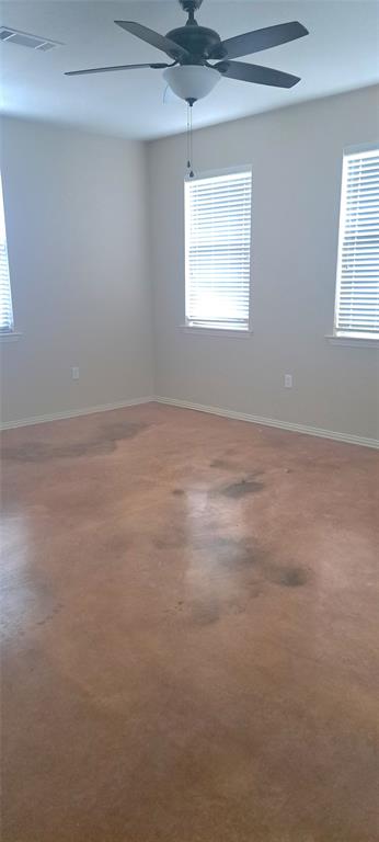 1301 Old Dicey Road, Unit 443 Weatherford, TX 76085 - Photo 6 of 11 a view of an empty room with a window