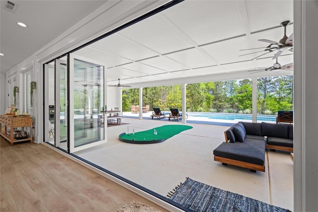 840 Old Driver Road Whitesburg, GA 30185 - Photo 20 of 88 a living room with couch and a large window
