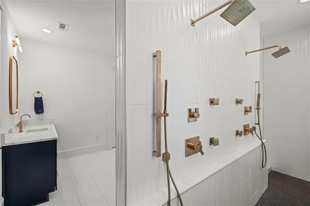 a bedroom with a bed dresser and a window