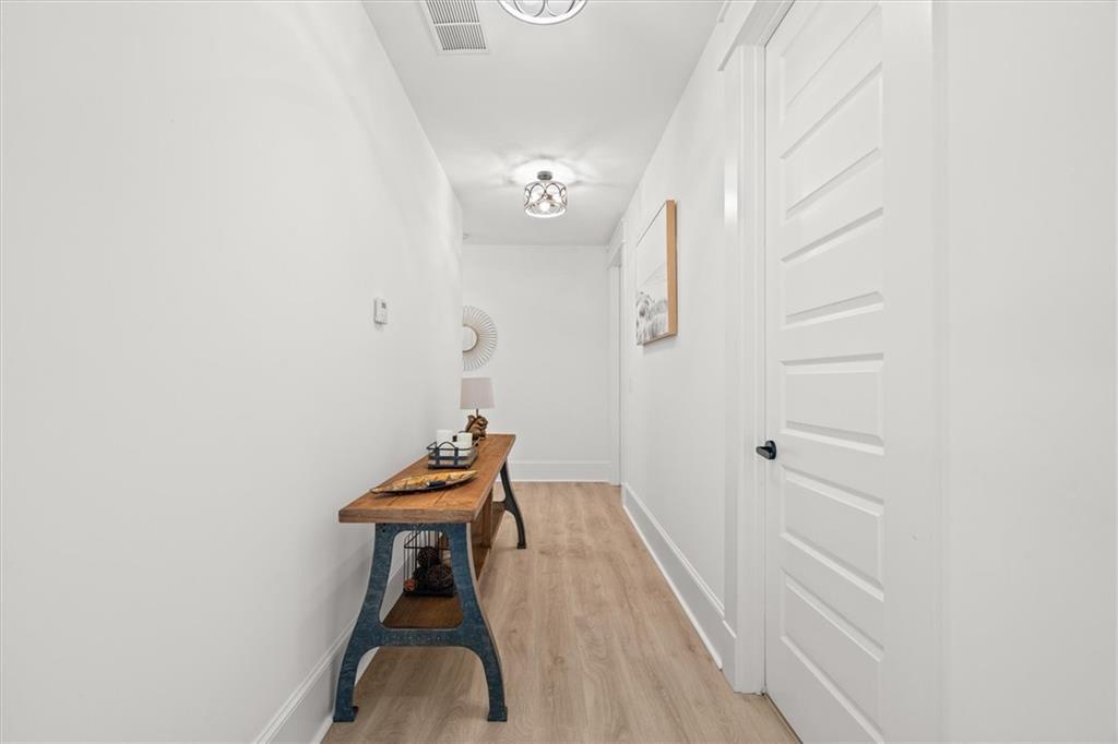 840 Old Driver Road Whitesburg, GA 30185 - Photo 40 of 88 a view of a hallway with staircase
