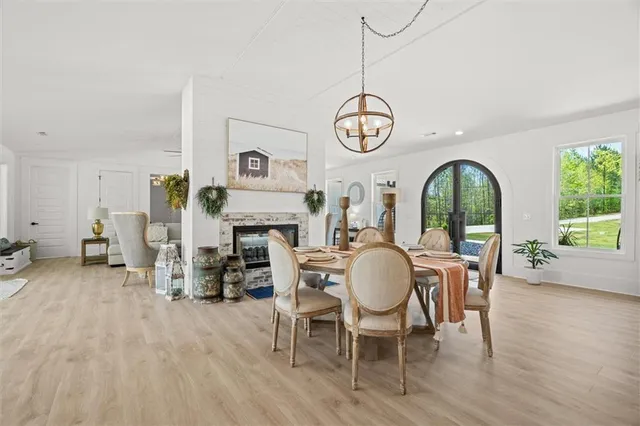 a large kitchen with kitchen island a large island in the center
