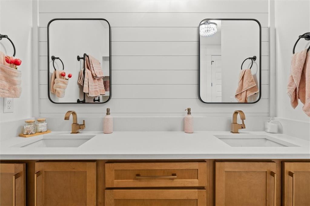 840 Old Driver Road Whitesburg, GA 30185 - Photo 53 of 88 a bathroom with a sink and a mirror