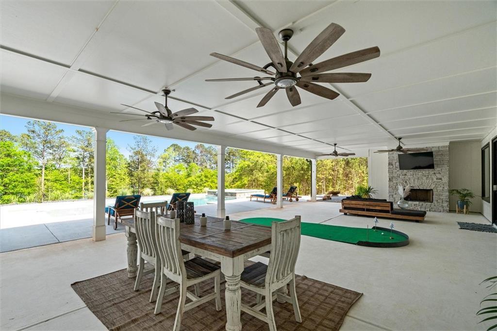 840 Old Driver Road Whitesburg, GA 30185 - Photo 66 of 88 a view of a dining room with furniture window and outside view