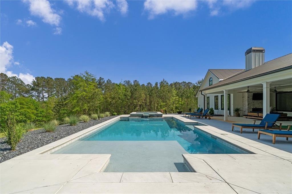 840 Old Driver Road Whitesburg, GA 30185 - Photo 70 of 88 a view of a house with swimming pool