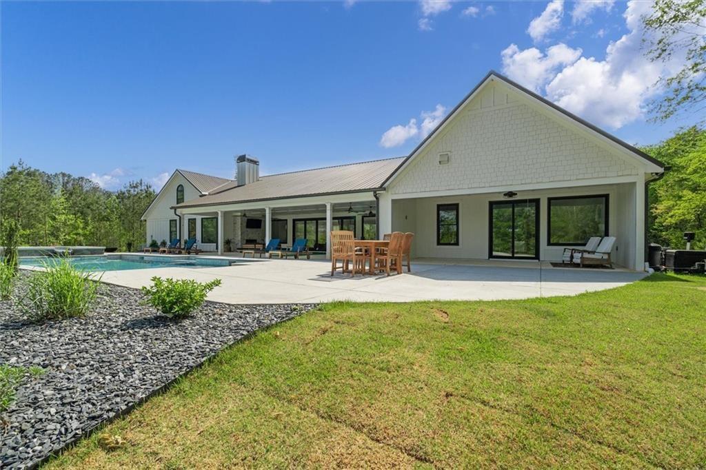 840 Old Driver Road Whitesburg, GA 30185 - Photo 76 of 88 a view of house with swimming pool outdoor seating