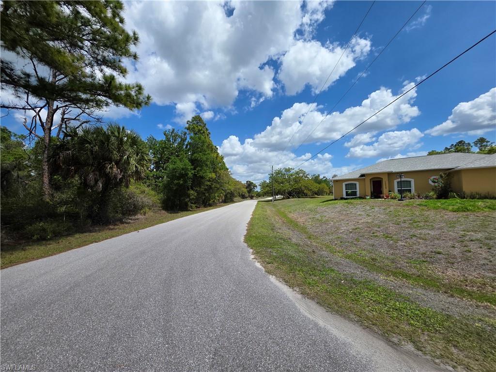 15530 Ravine Avenue Port Charlotte, FL 33953 - Photo 2 of 5 a front view of a house with a yard