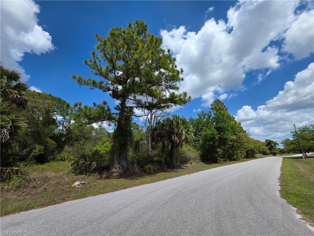 15530 Ravine Avenue Port Charlotte, FL 33953 - Photo 3 of 5 a view of a street