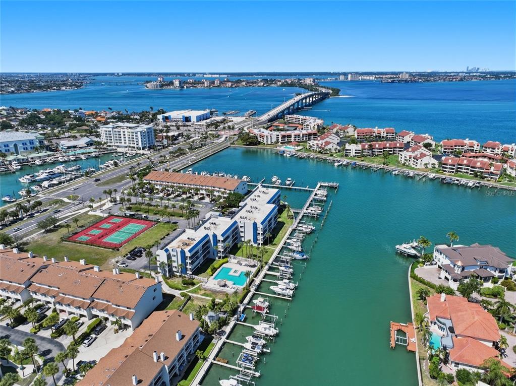 363 Pinellas Bayway South, Unit 29 Tierra Verde, FL 33715 - Photo 54 of 59 an aerial view of ocean and residential houses with outdoor space