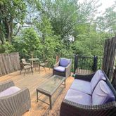 a outdoor living space with furniture and garden view