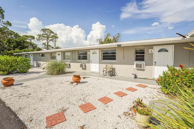 a front view of a house with patio