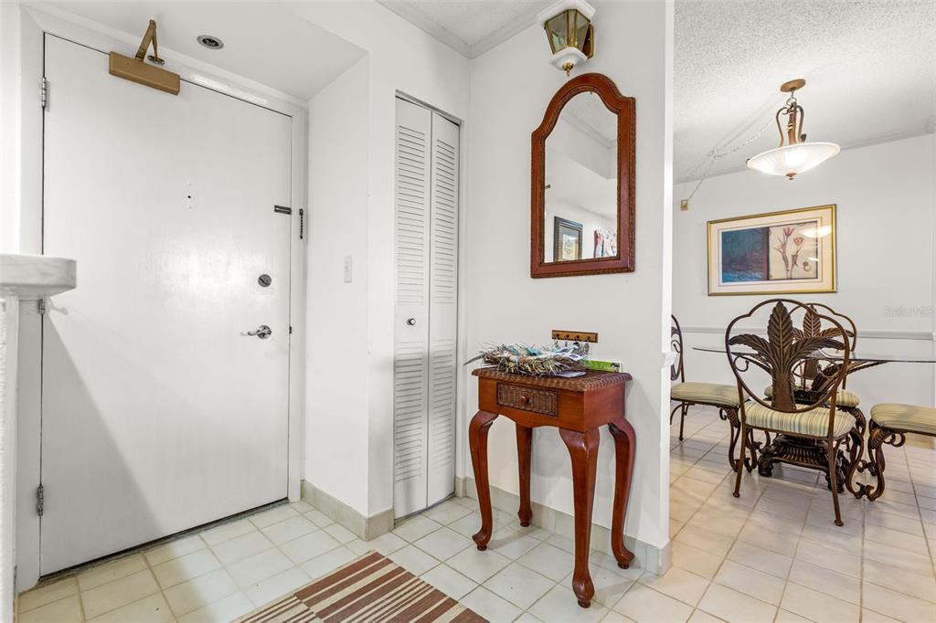 1 Key Capri, Unit 104E Treasure Island, FL 33706 - Photo 11 of 45 a view of a workspace with furniture