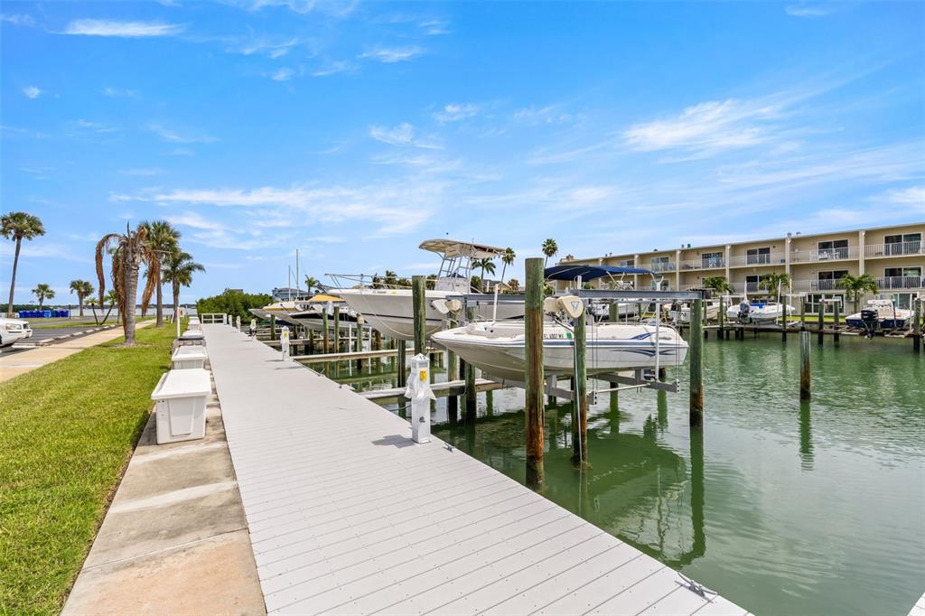 1 Key Capri, Unit 104E Treasure Island, FL 33706 - Photo 34 of 45 a view of a lake with a city