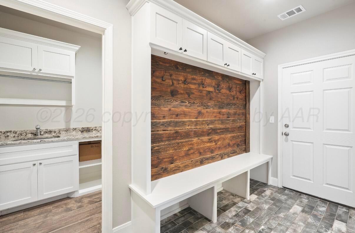 36 Quay Lane Canyon, TX 79015 - Photo 26 of 28 a view of kitchen with wooden floor and electronic appliances