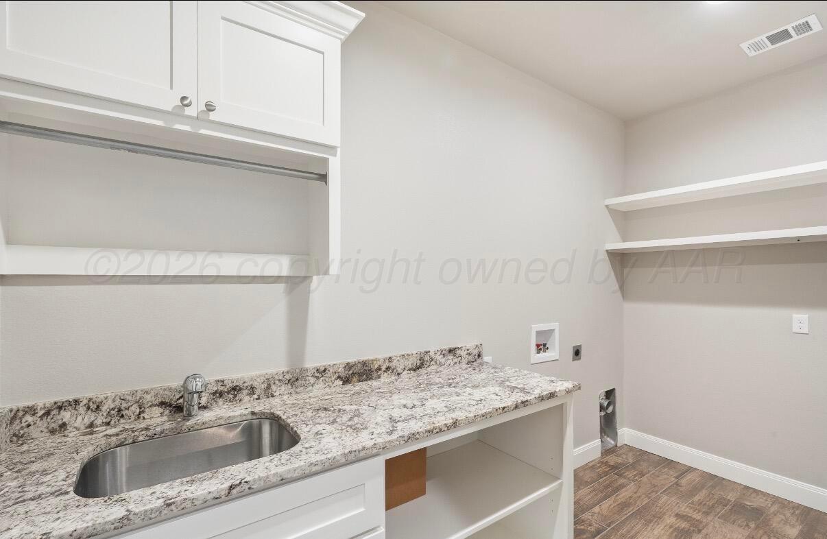 36 Quay Lane Canyon, TX 79015 - Photo 27 of 28 a bathroom with a sink and vanity