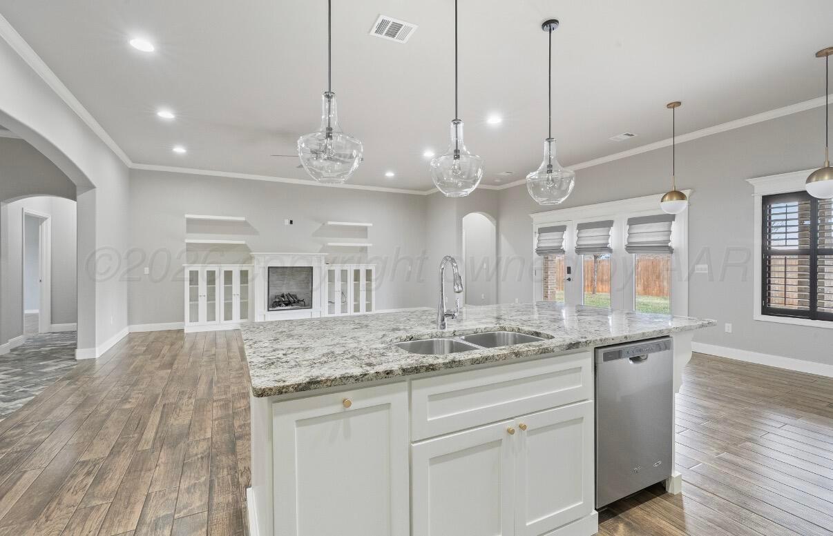 36 Quay Lane Canyon, TX 79015 - Photo 6 of 28 a view of a kitchen counter space and wooden floor