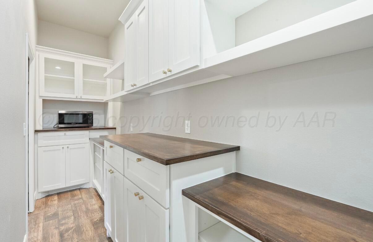 36 Quay Lane Canyon, TX 79015 - Photo 10 of 28 a kitchen with cabinets appliances and a counter space