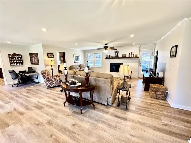 a view of a dining room with furniture and window