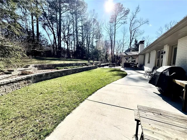 a view of parking garage with cars