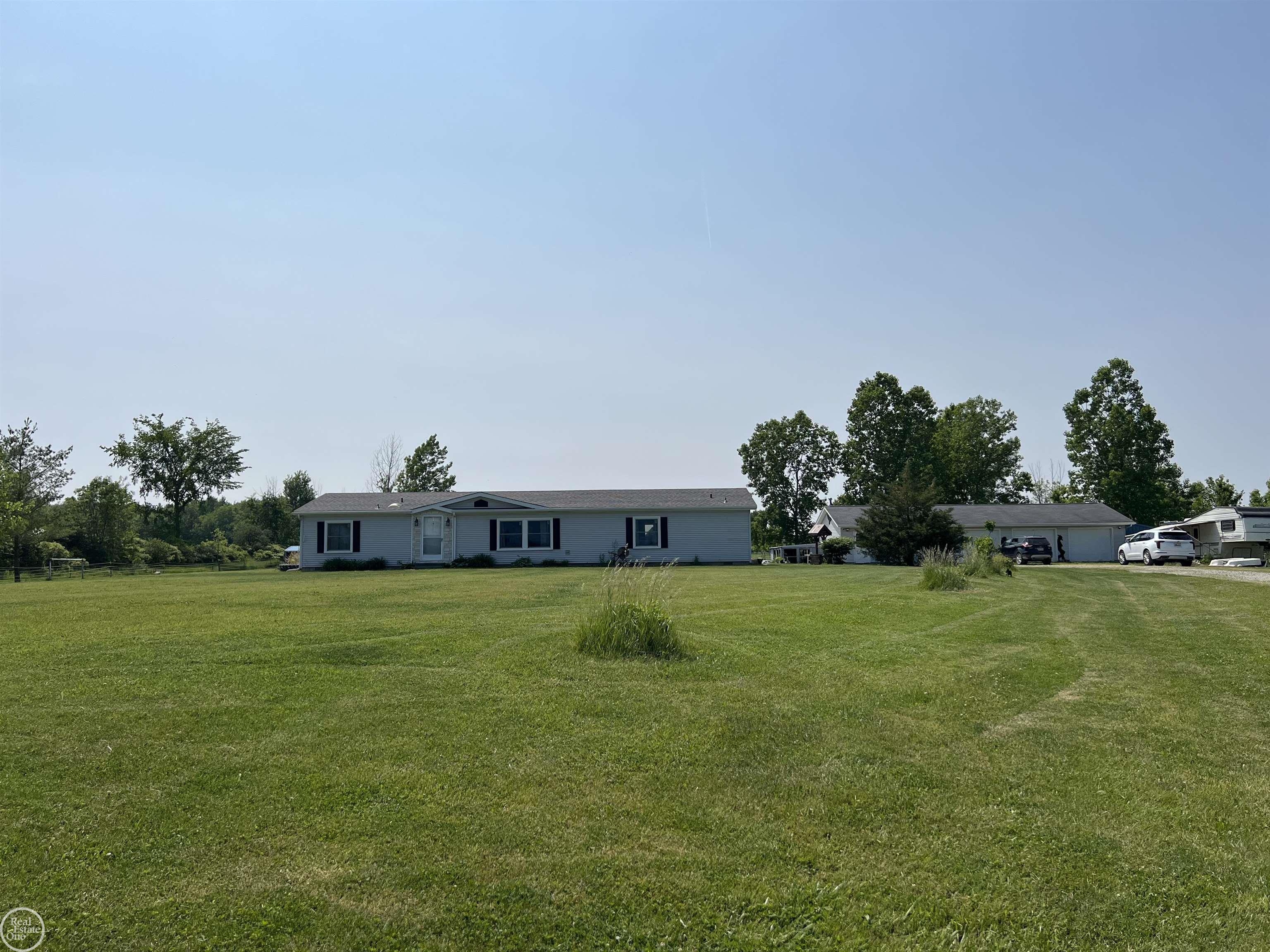 6170 Cribbins Road Croswell, MI 48422 - Photo 1 of 25 FRONT