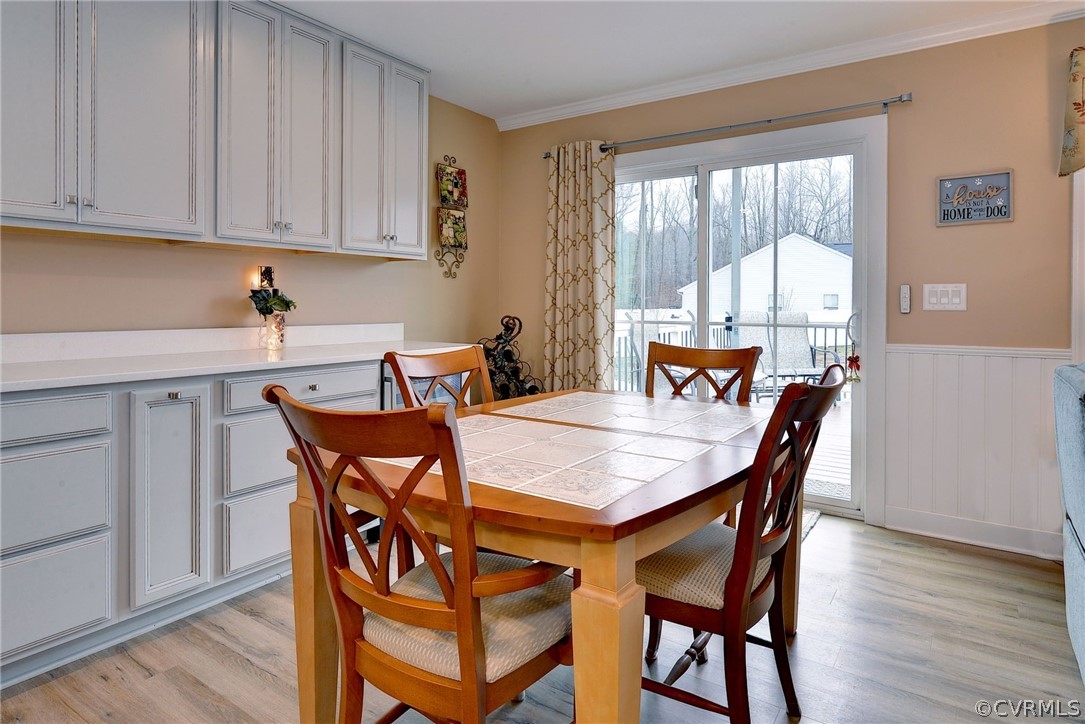 204 Arbordale Loop Williamsburg, VA 23188 - Photo 13 of 41 a view of a dining room that has a table and chairs in it