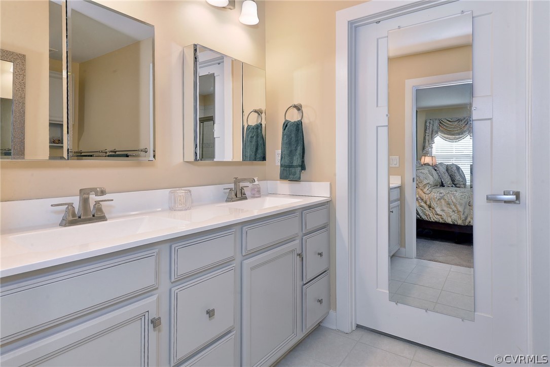 204 Arbordale Loop Williamsburg, VA 23188 - Photo 18 of 41 a en suite bathroom with 2 sink and a mirror