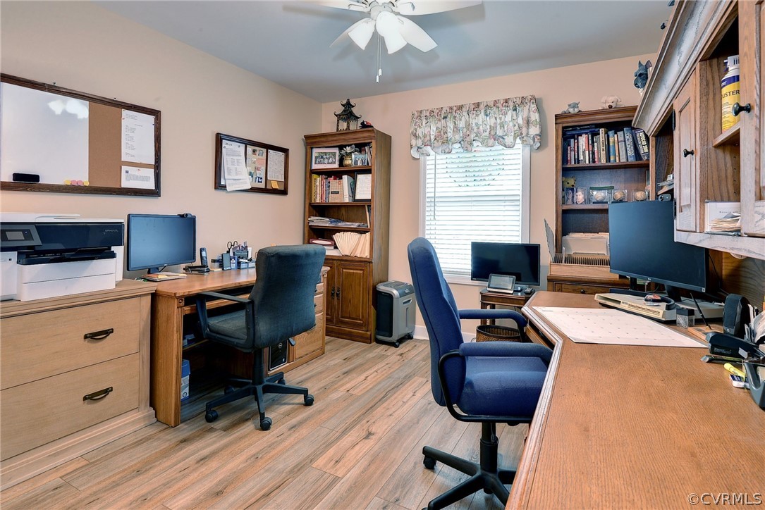 204 Arbordale Loop Williamsburg, VA 23188 - Photo 21 of 41 a view of a workspace with furniture and a window