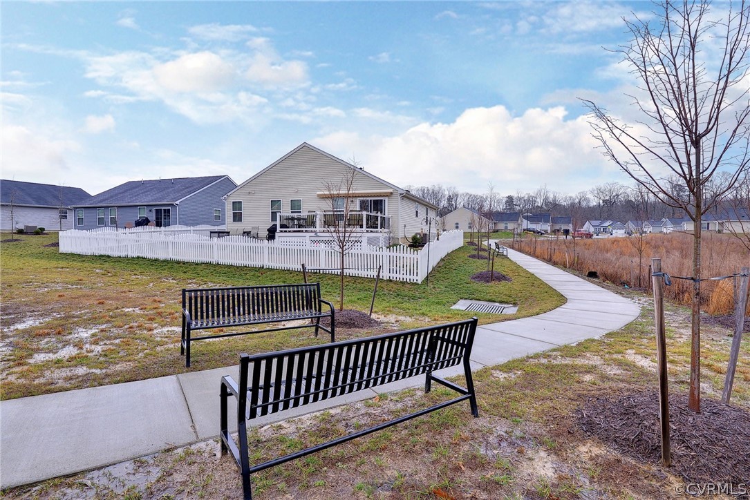 204 Arbordale Loop Williamsburg, VA 23188 - Photo 31 of 41 a view of a house with backyard and sitting area