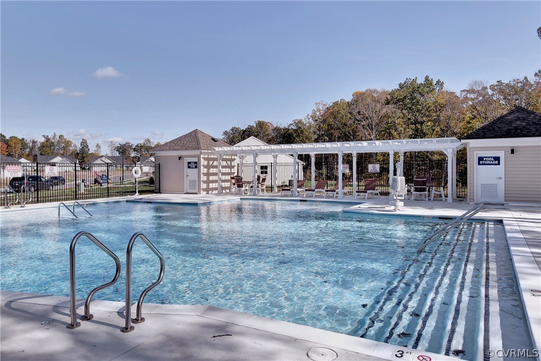 204 Arbordale Loop Williamsburg, VA 23188 - Photo 35 of 41 a view of a house with pool and chairs