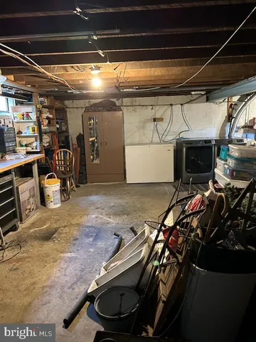 a bathroom with a shower and a sink