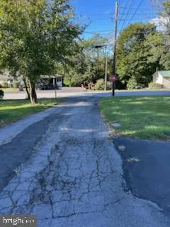 a view of a brick house with many windows